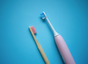 - Tandlægerne Gammel Strand - two ultrasonic electric toothbrushes on a blue bac 2023 11 27 04 57 57 utc - Everything about teeth